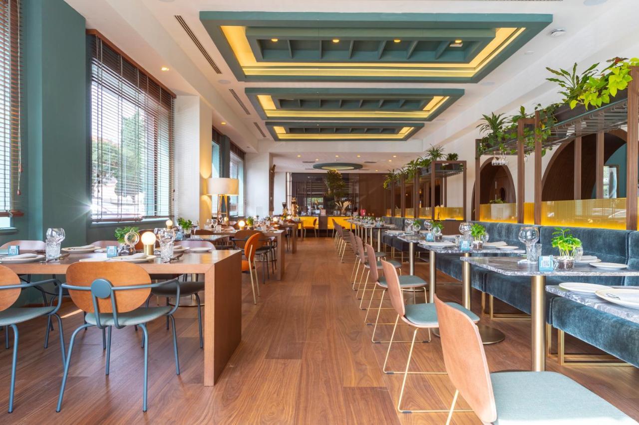 Melia Milano Hotel Luaran gambar The interior of the restaurant