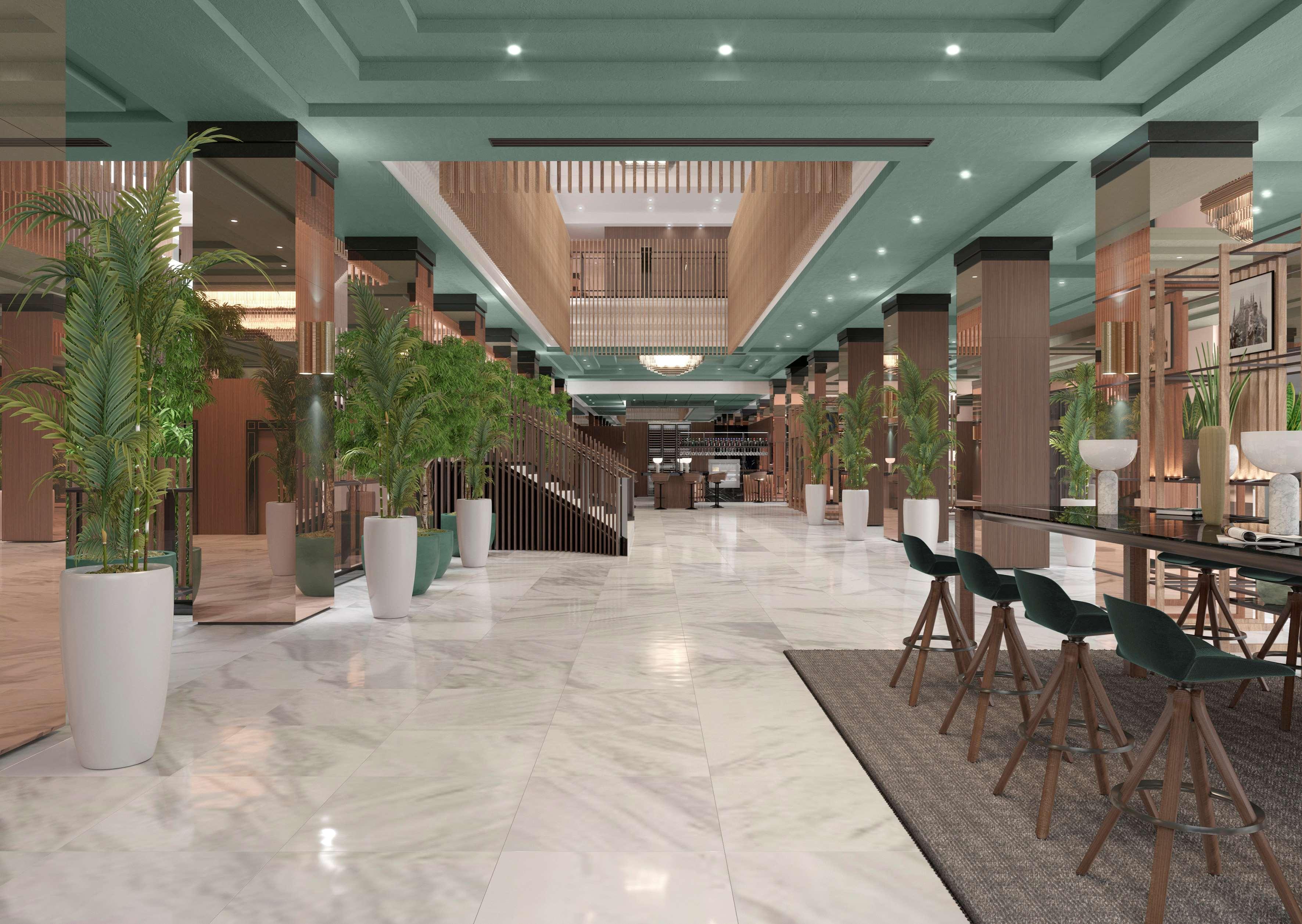 Melia Milano Hotel Luaran gambar The interior of the hotel